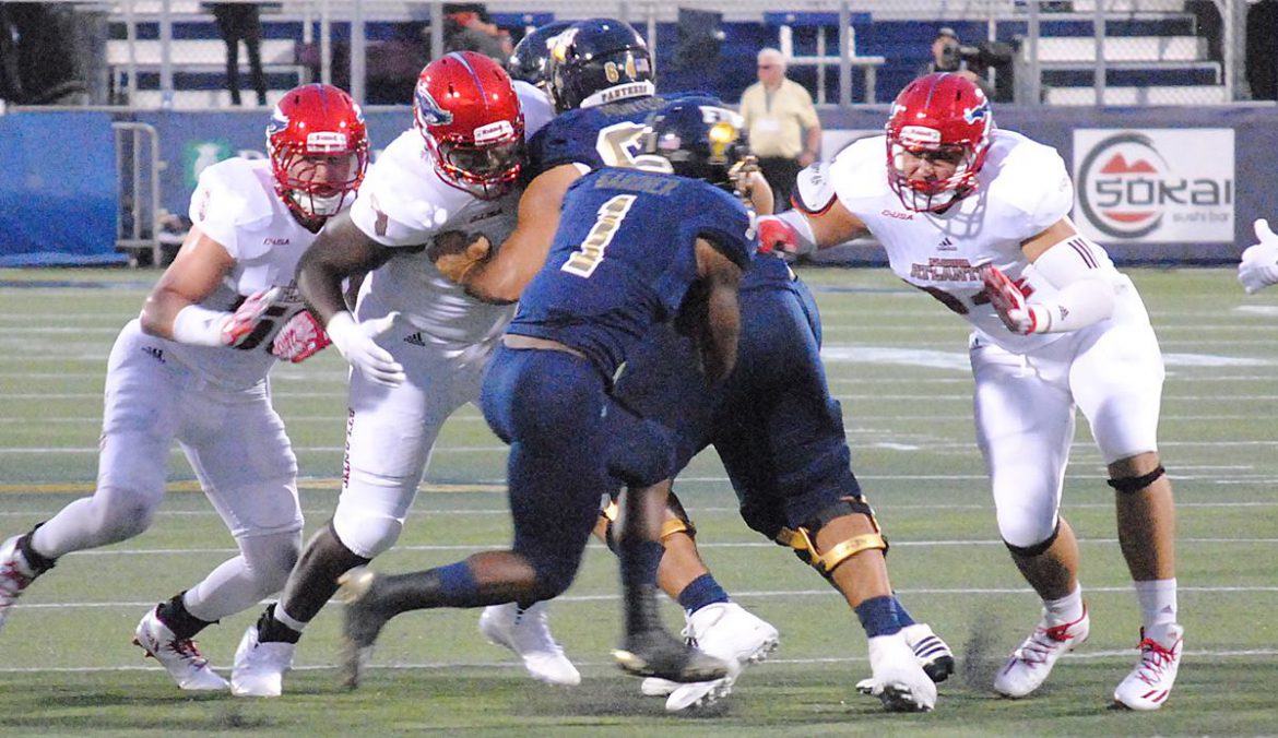 FINAL: FIU 33, FAU 31<br> Photo Gallery <div class='secondary-title'><span style='color:#818181;font-size:14px;'>Photos from before, during and after FAU's loss to FIU in the Shula Bowl.</div>